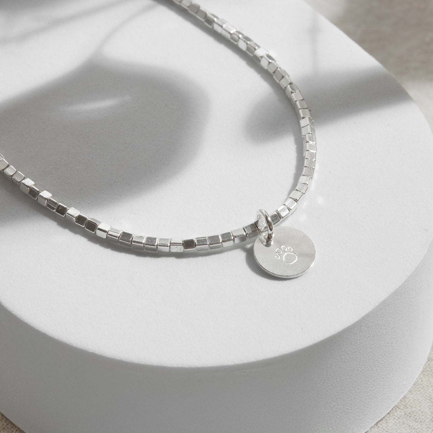 PULSERA CUADRADITA PLATA 950 INICIAL PLAQUITA