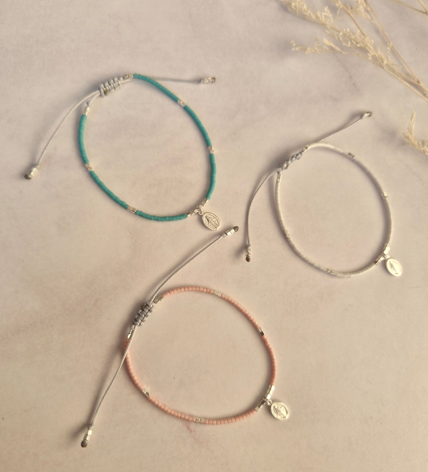 PULSERA ROSA AJUSTABLE VÍRGEN DE LOS RAYOS