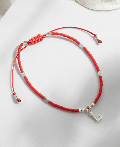 PULSERA ROJA AJUSTABLE INICIAL FORMA