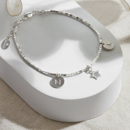 PULSERA CUADRADITA PLATA 950 INICIAL PLAQUITA