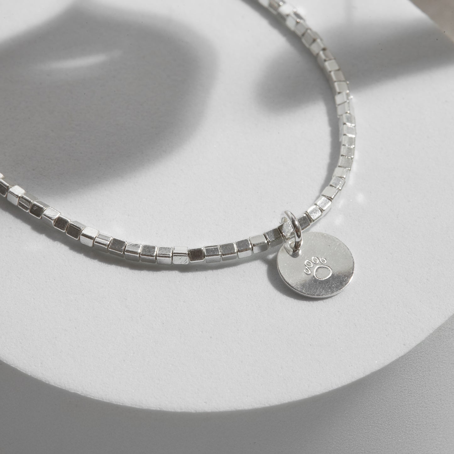 PULSERA CUADRADITA PLATA 950 INICIAL PLAQUITA