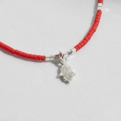 PULSERA ROJA AJUSTABLE DIJE A ELECCIÓN