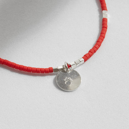 PULSERA ROJA AJUSTABLE DIJE A ELECCIÓN