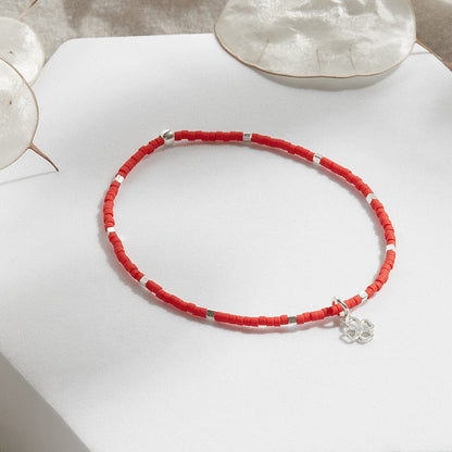 PULSERA ROJA ELASTICADA PLATA DIJE A ELECCIÓN