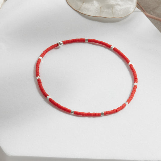PULSERA ROJA ELASTICADA PLATA