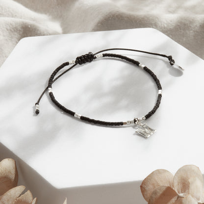 PULSERA NEGRA AJUSTABLE INICIAL FORMA