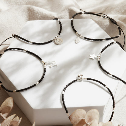 PULSERA NEGRA AJUSTABLE DIJE A ELECCIÓN