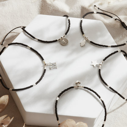 PULSERA NEGRA AJUSTABLE DIJE A ELECCIÓN