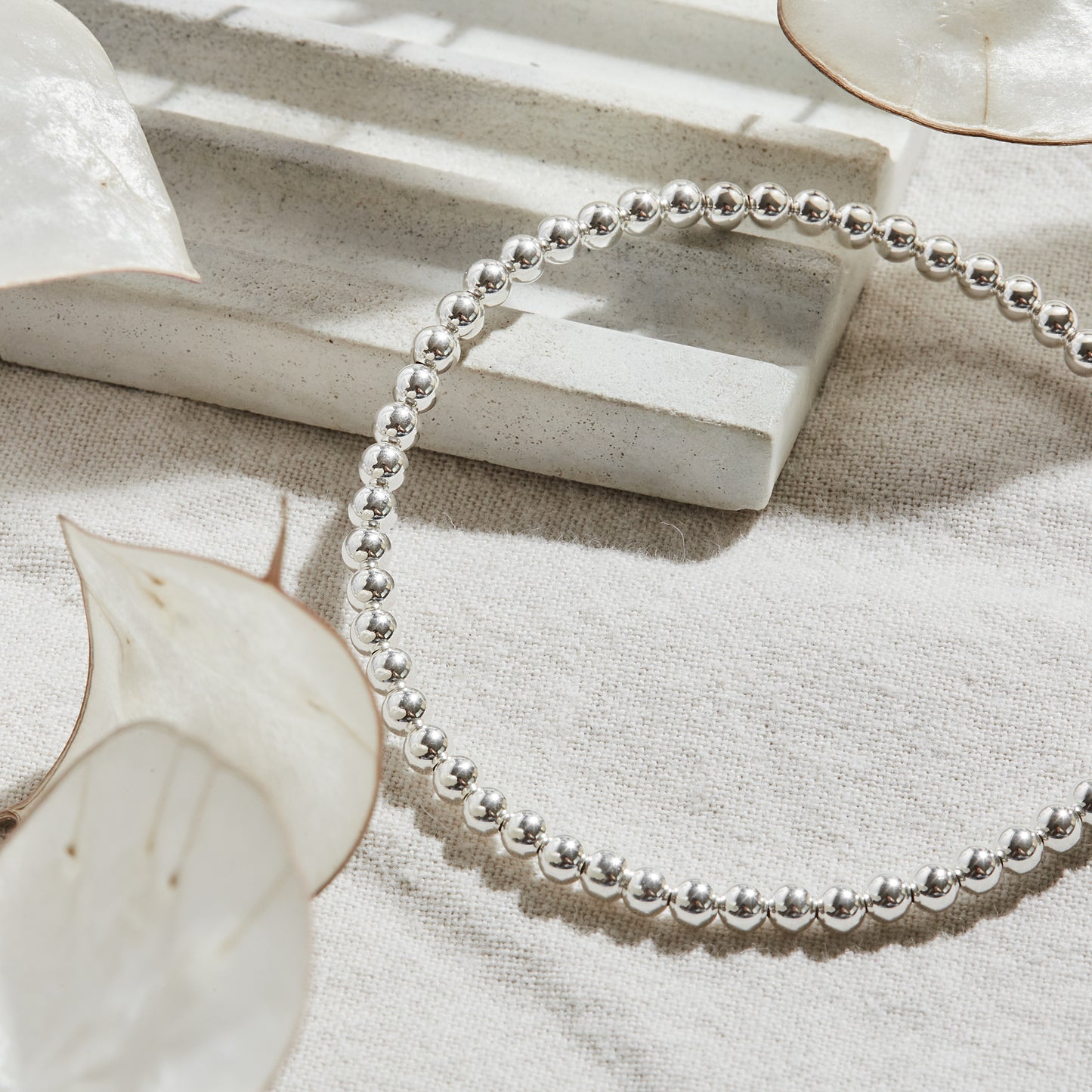 PULSERA ELASTICADA PLATA