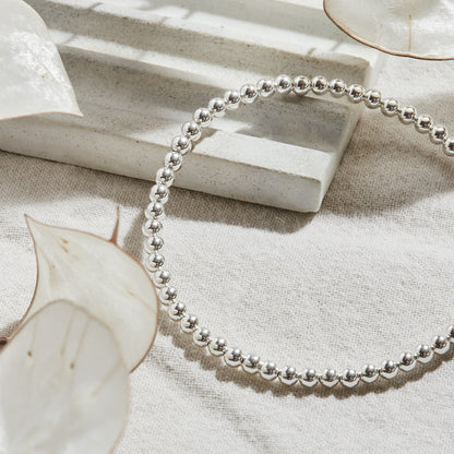 PULSERA ELASTICADA PLATA