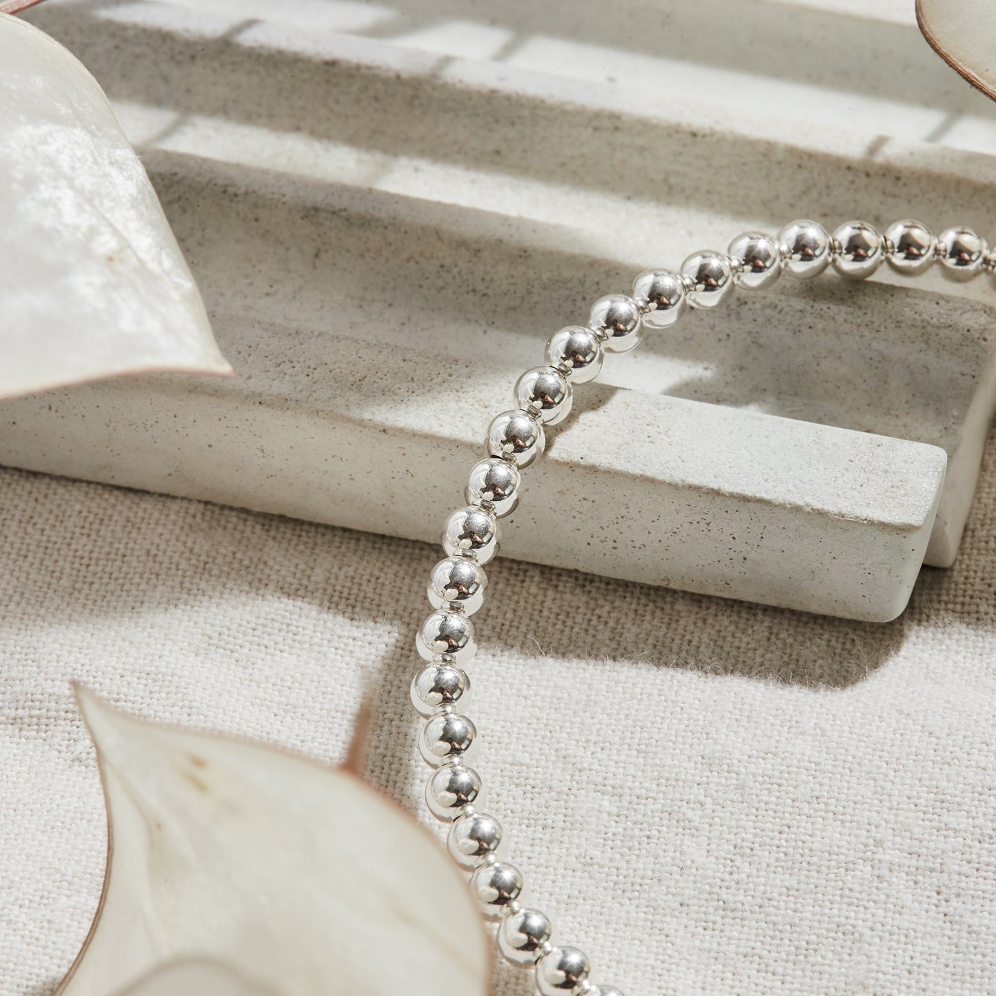 PULSERA ELASTICADA PLATA