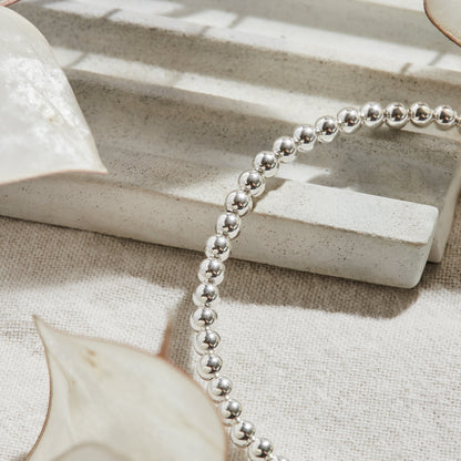 PULSERA ELASTICADA PLATA