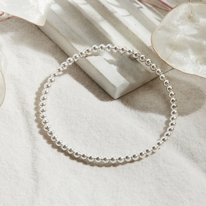 PULSERA ELASTICADA PLATA