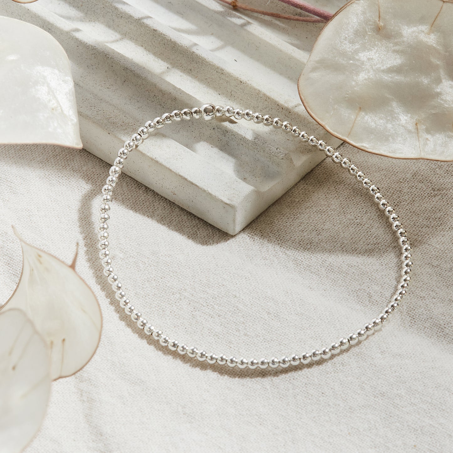 PULSERA ELASTICADA PLATA