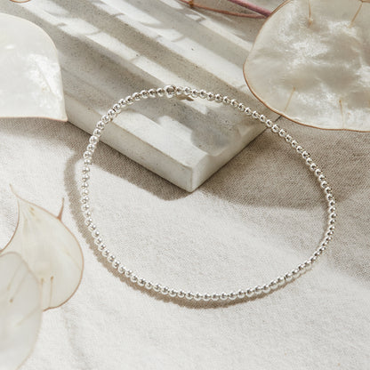 PULSERA ELASTICADA PLATA