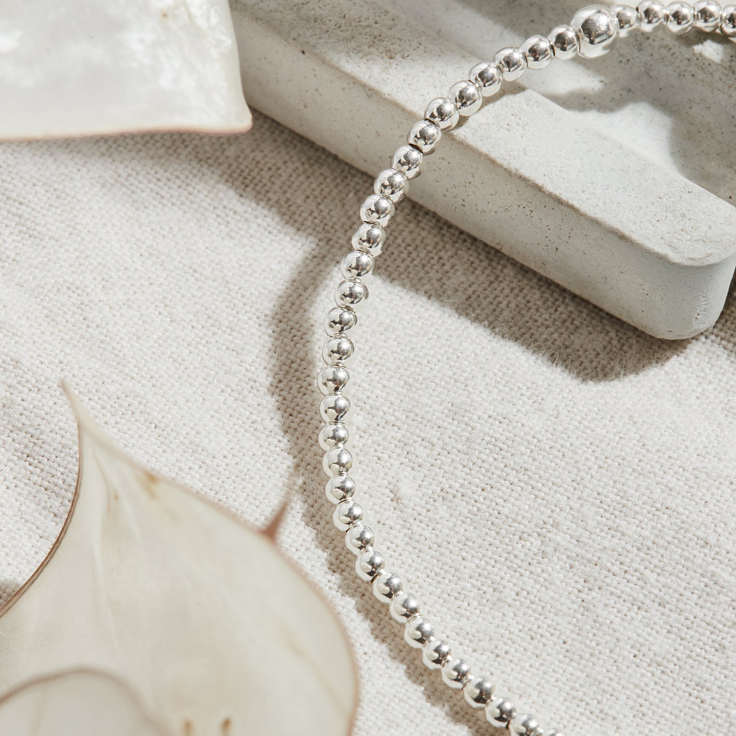 PULSERA ELASTICADA PLATA