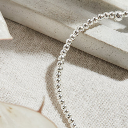 PULSERA ELASTICADA PLATA