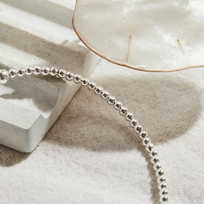 PULSERA ELASTICADA PLATA