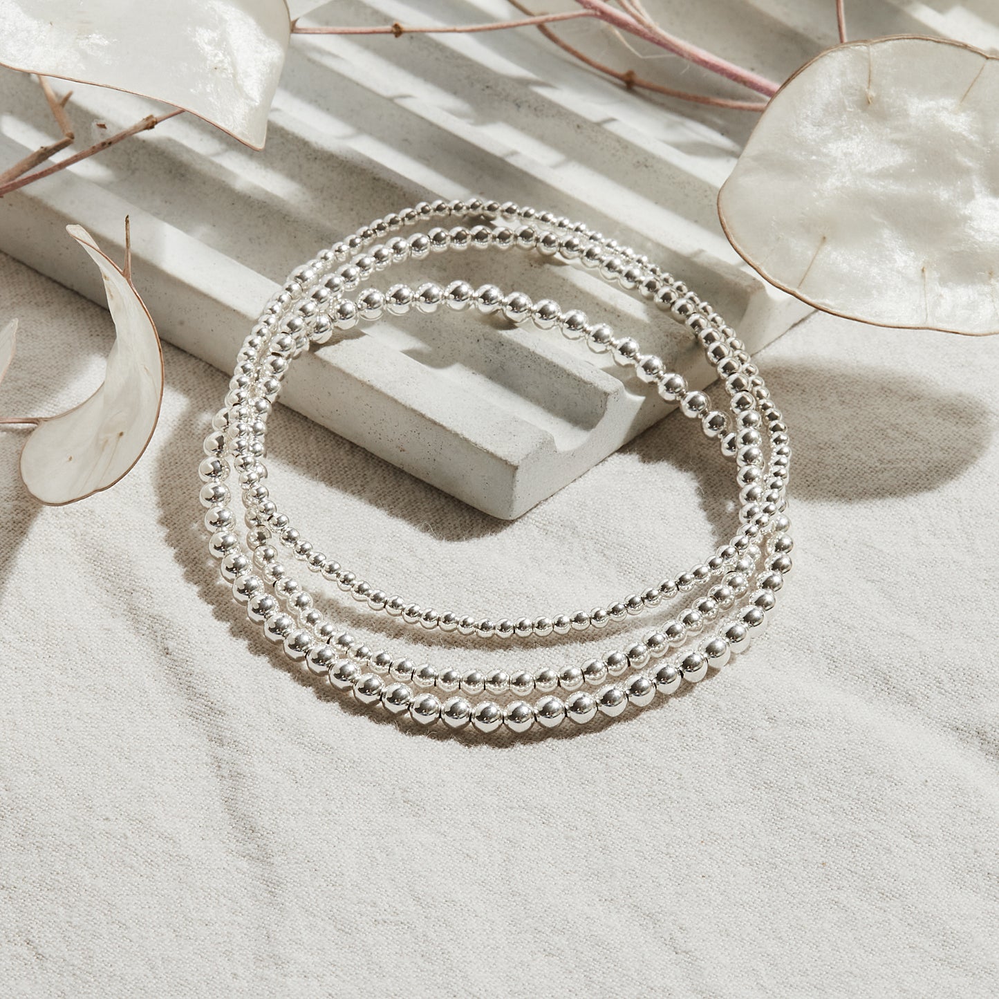 PULSERA ELASTICADA PLATA