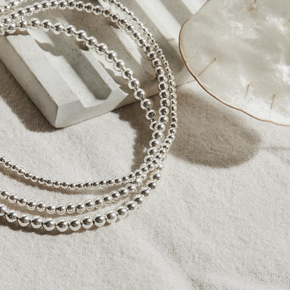 PULSERA ELASTICADA PLATA