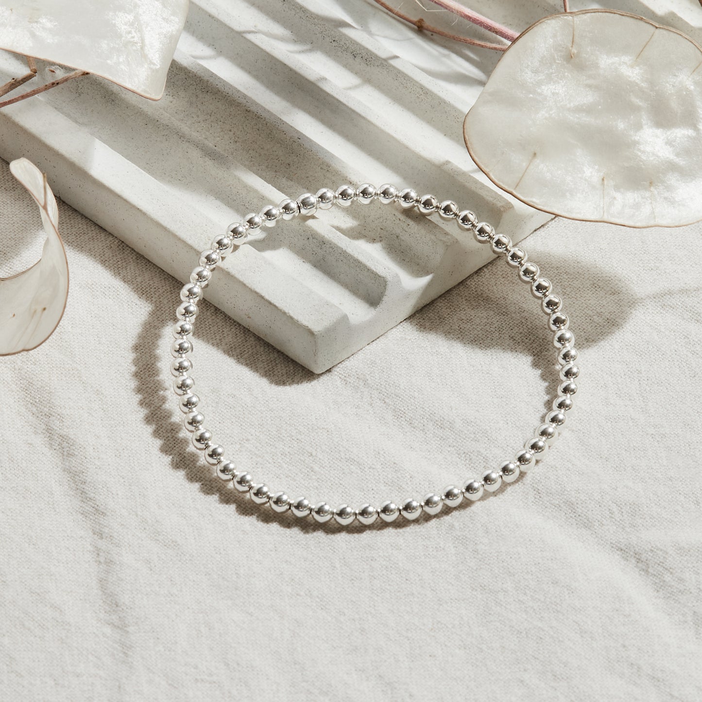 PULSERA ELASTICADA PLATA