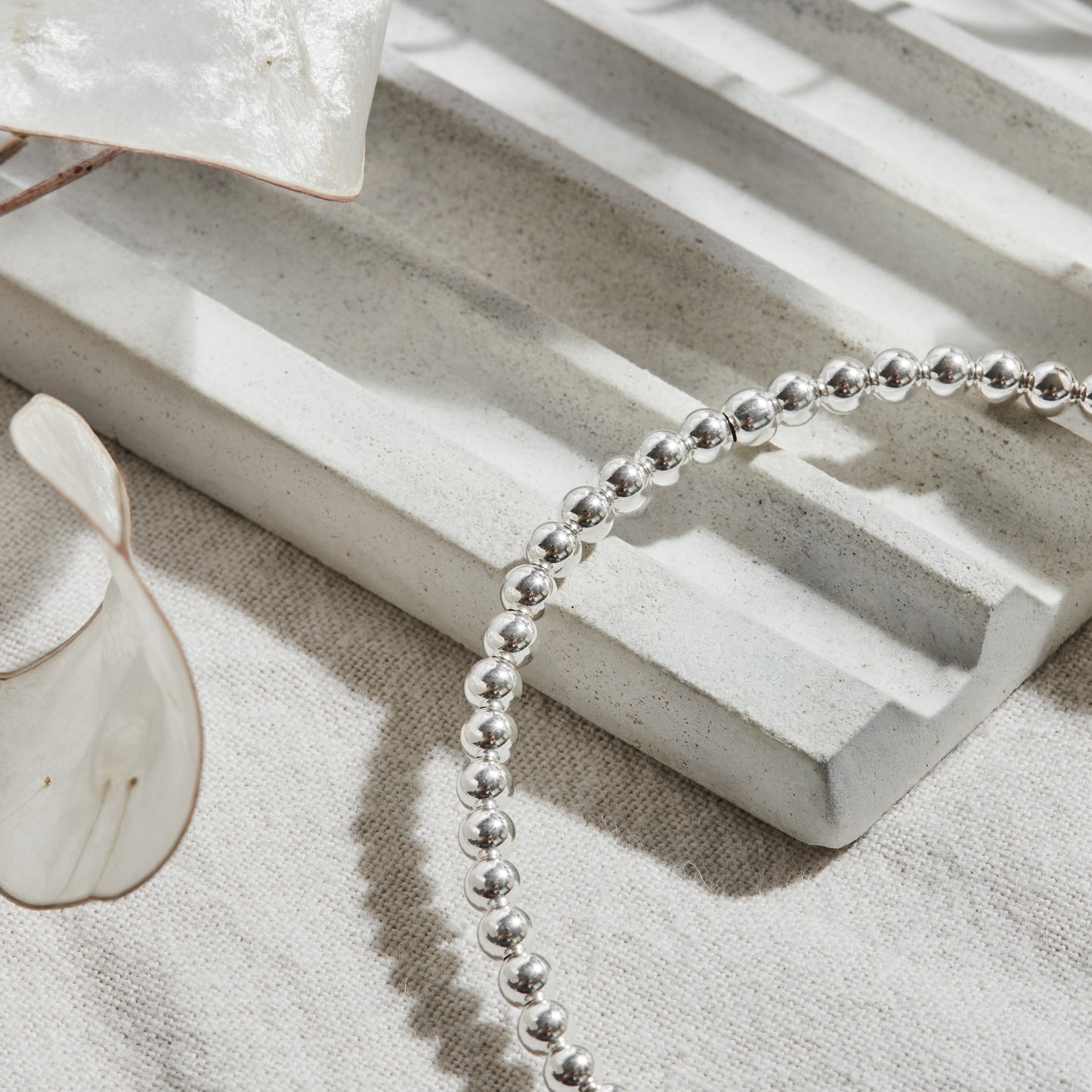 PULSERA ELASTICADA PLATA