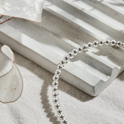 PULSERA ELASTICADA PLATA