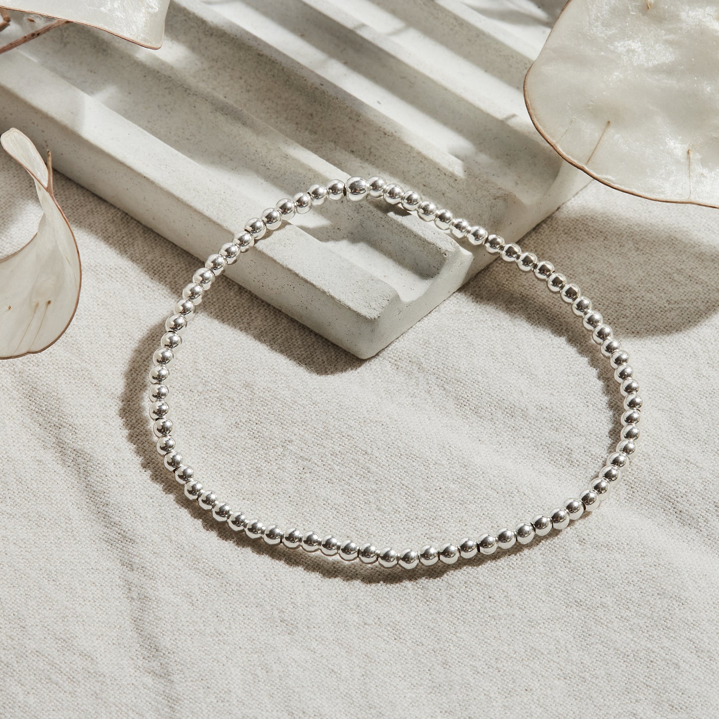 PULSERA ELASTICADA PLATA