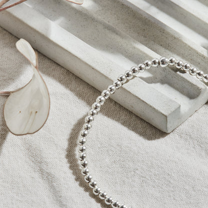 PULSERA ELASTICADA PLATA