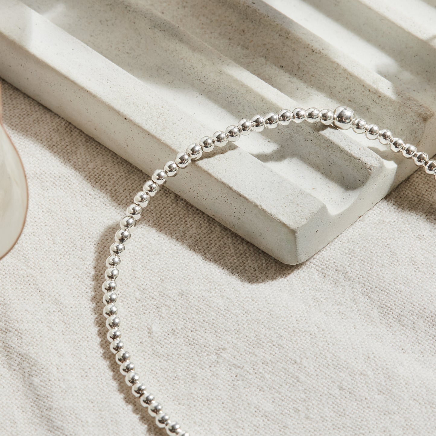 PULSERA ELASTICADA PLATA