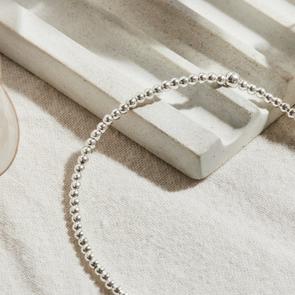 PULSERA ELASTICADA PLATA