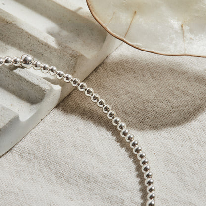 PULSERA ELASTICADA PLATA