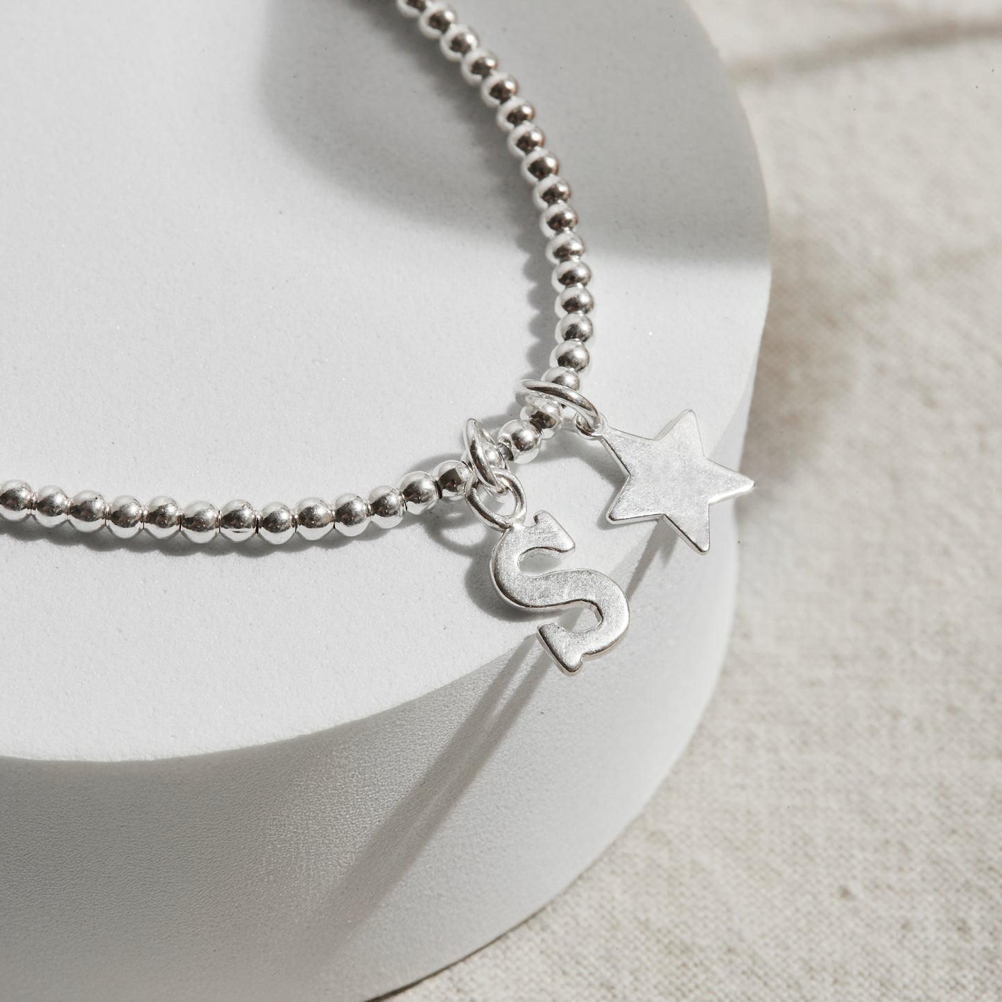 PULSERA BOLITA PLATA 950 INICIAL FORMA