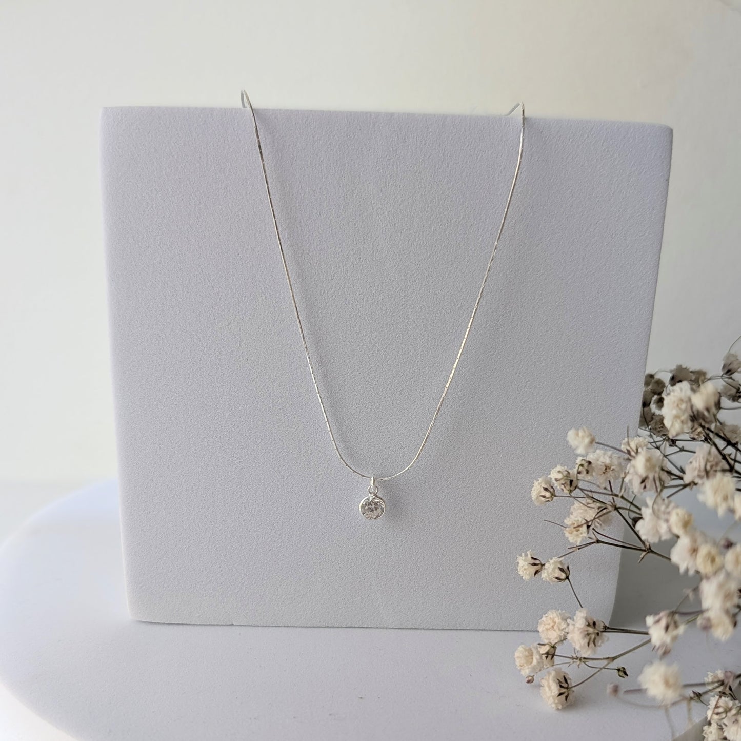 COLLAR PUNTO DE LUZ PLATA .925 (CADENA A ELECCIÓN)