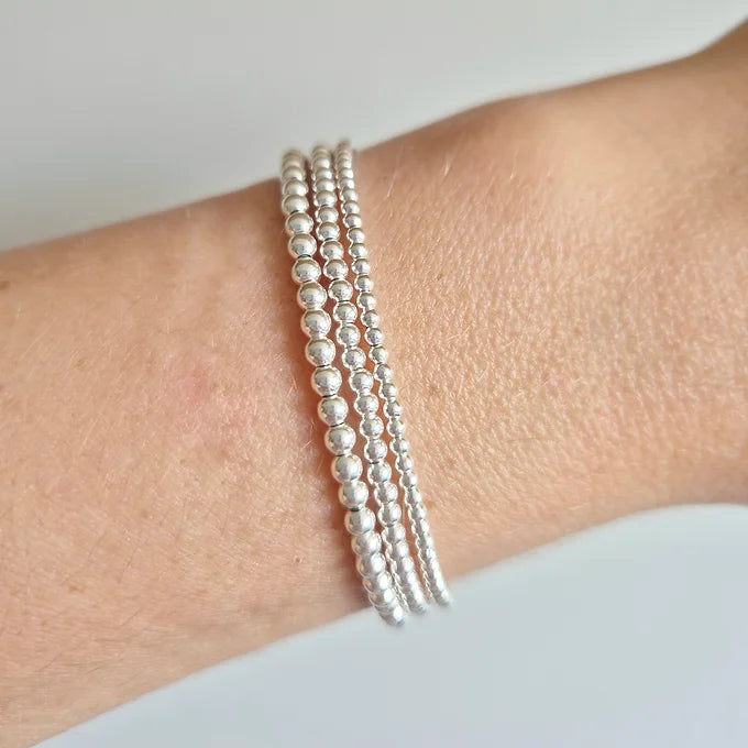 PULSERA ELASTICADA PLATA