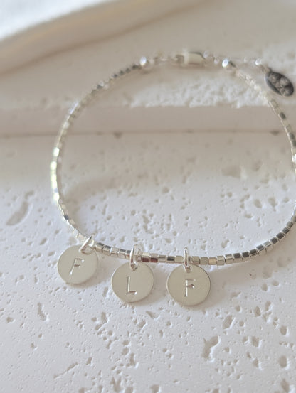 PULSERA CUADRADITA PLATA 950 INICIAL PLAQUITA