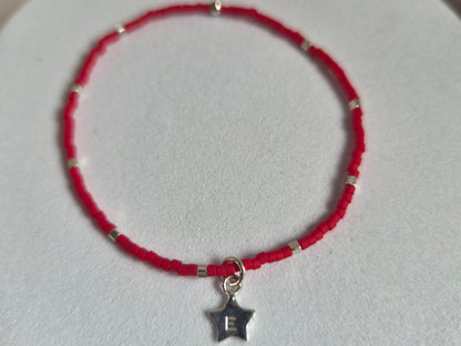 PULSERA ROJA ELASTICADA PLATA INICIAL ESTRELLA