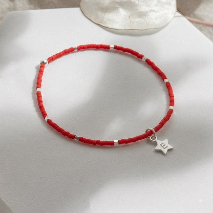 PULSERA ROJA ELASTICADA PLATA INICIAL ESTRELLA