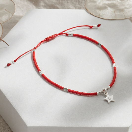 PULSERA ROJA AJUSTABLE INICIAL ESTRELLA